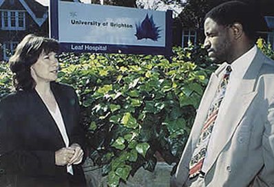 Two people standing outside the Leaf Hospital, 1994
