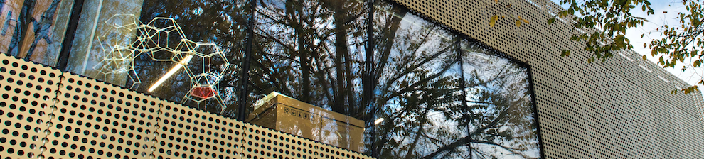 Angle of gold perforated building facade of Advanced Engineering Centre at the University of Brighton