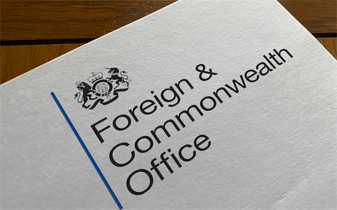 Corner of paper on a desk with the logo of the British Foreign and Commonwealth Office as letterhead
