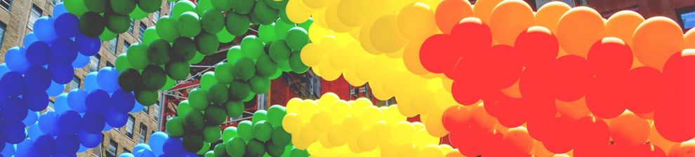 Pride ballons in rainbow colours at Pride celebration, courtesy of Gagnonm and Pixabay