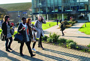 Students walking on the Falmer campus