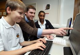 School pupils at computer screens