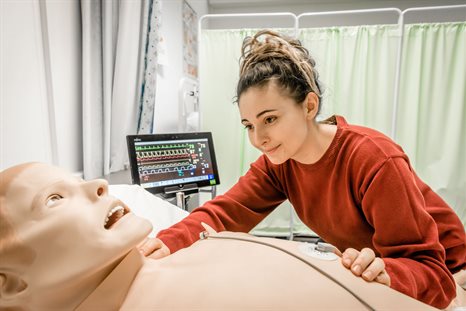 student in simulation with mannequin