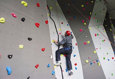 Student on a climbing wall