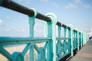 Brighton seafront railing with the sea in the background