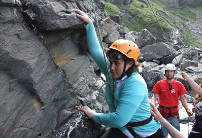 Lexi Hibberd rock climbing