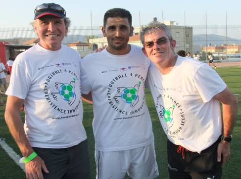 John Sugden, Abbas Suan and Gary Stidder in Football 4 Peace t-shirts