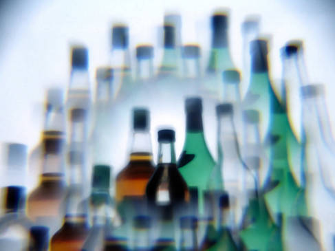 Blurred image of bottles, Wikimedia Commons