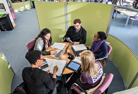 Students working together in a study pod