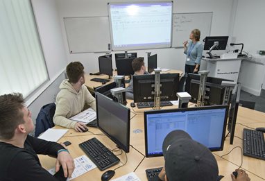 Students and lecturer in classroom