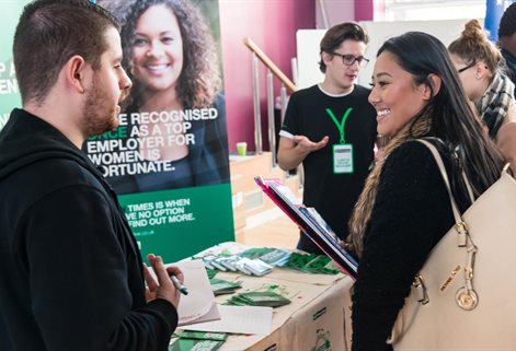 Student and employer chatting at a Careers Fair
