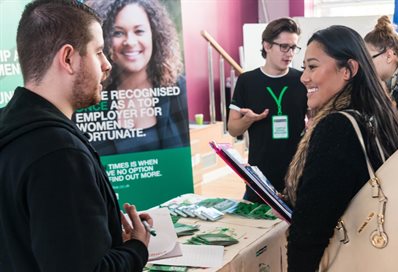 Student chatting with an employer at a Careers Fair