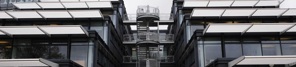 View of the terraced glass rear of Checkland Building, University of Brighton.