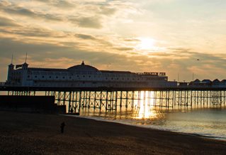Silhouette of Brighton pier at sunrise