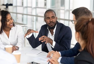 Apprentices in a class discussion