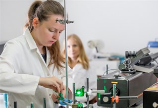 Apprentice working in a lab