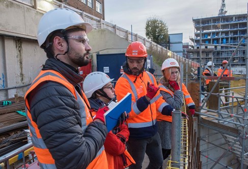 Postgraduates on construction site