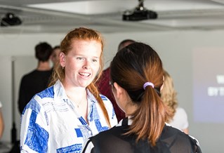 Delegates chatting at an event
