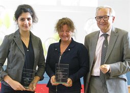 Aryako Rahimi and Alba Lewis Momentum Brighton Partnership of the Year 2016-17 receiving their awards from Professor Chris Pole