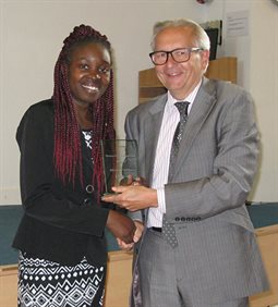 Erika Gogo Momentum Brighton Mentee of the Year 2016-17 receiving her award from Professor Chris Pole