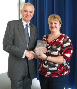 Momentum Hastings Mentee of the Year 2016-17 Laura Veselovsky receiving her award from Hastings Campus Director, Paul Frost.