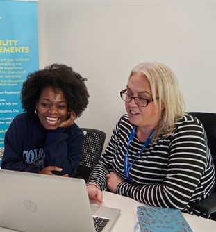 student and adviser in placement office