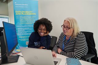 Student talking to career adviser