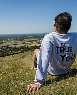 'Be true' student looking at sussex downs