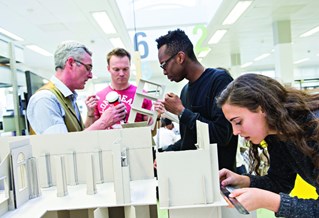 Architecture students working in the studio