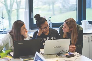student adviser helping young people through clearing