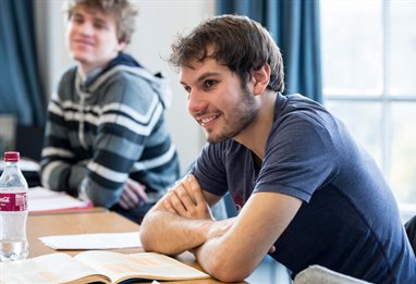 Humanities student smiling in a lecture