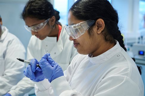 bioscience student wearing safety glasses