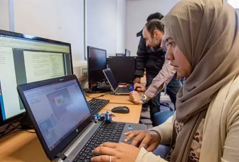 Female student working in the cyber security lab