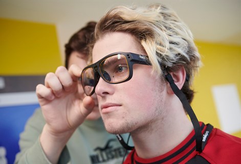 Student wearing eye tracking glasses