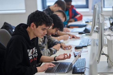 Students working on computers