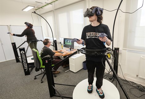 students using head sets in VR suite
