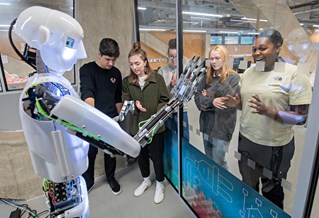 Group of students in the robotics lab