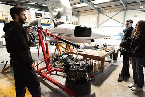 Man explaining aircraft engine