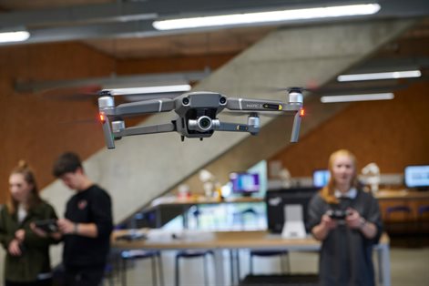 Students flying a drone