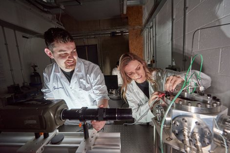 Two students working in an engineering lab