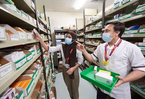 Pharmacy placement student in medicines room