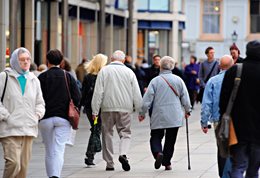 People wandering around a shopping precinct