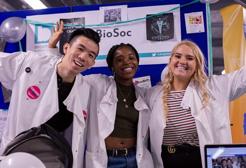 Photo of three BSU Bioscience Society students at an open day