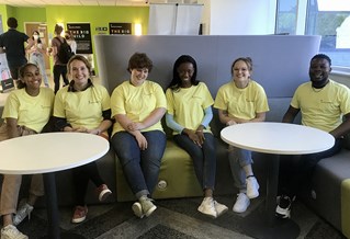 Six Wellbeing Champions in matching tshirts