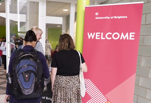 Doctoral college awards day with Welcome poster