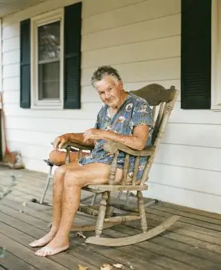Esme Scott - Man sat in porch