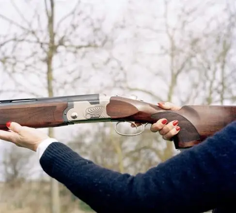 Jess Bootes - Man aiming firearm