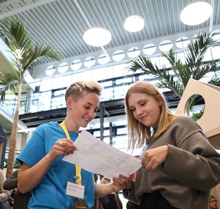 Student with a member of staff