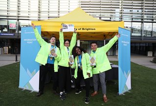 A group of happy student ambassadors at an open day