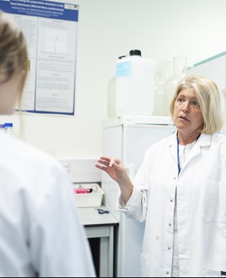 Dr Corina Ciocan and laboratory researcher in University of Brighton clinical sciences laboratory